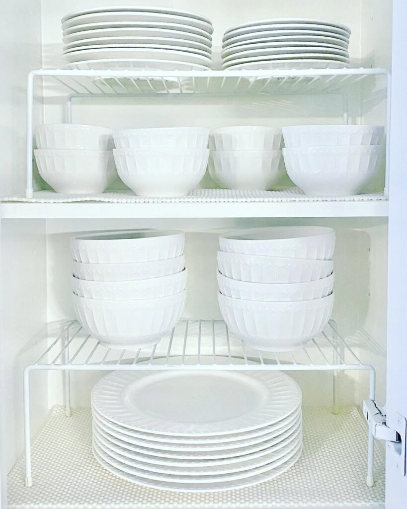 Use Stackable Shelf Risers to Double Cabinet Space